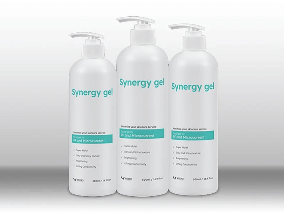Three white 500ml pump bottles of Synergy Gel for RF and microcurrent skincare treatments