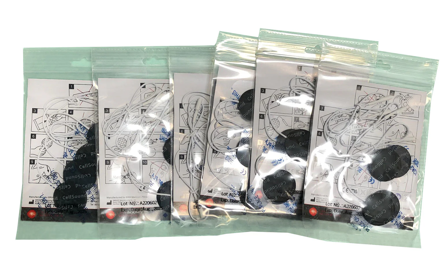 Six resealable bags each with round black electrode pads, white lead wires and instruction sheets for TENS therapy
